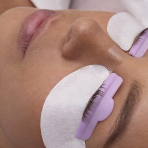 high-angle-young-woman-wearing-eye-patches
